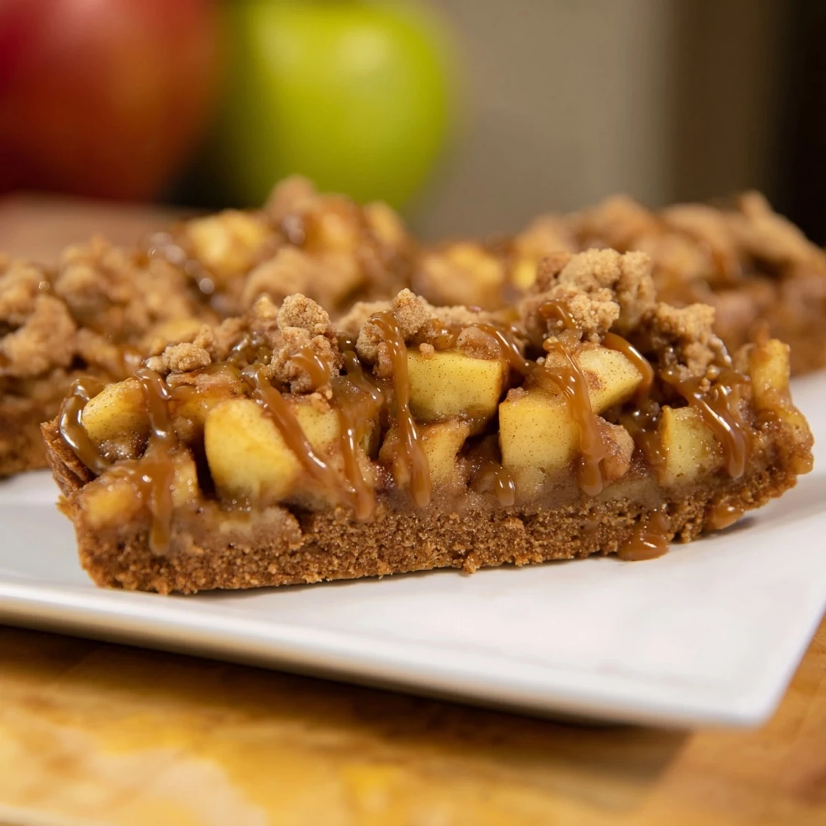 Freshly baked Caramel Apple Cookie Bars with a gooey caramel layer, ideal for sharing with friends.
