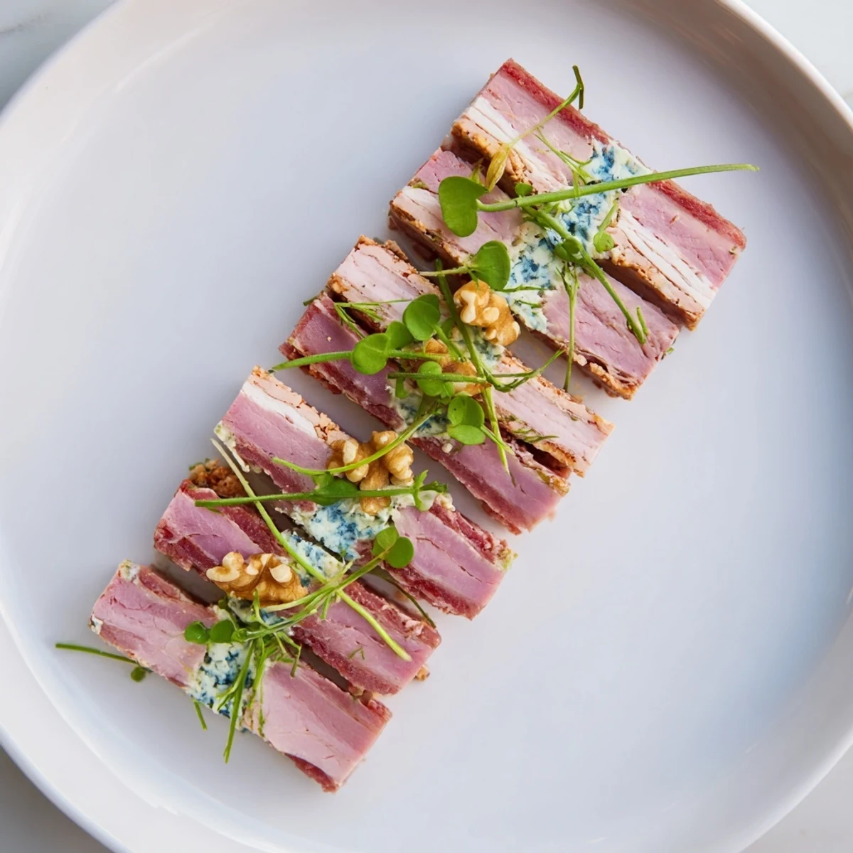 See the beautiful layers of beef, pork, and the vibrant blue cheese river in this Grand Canyon Rim recipe.