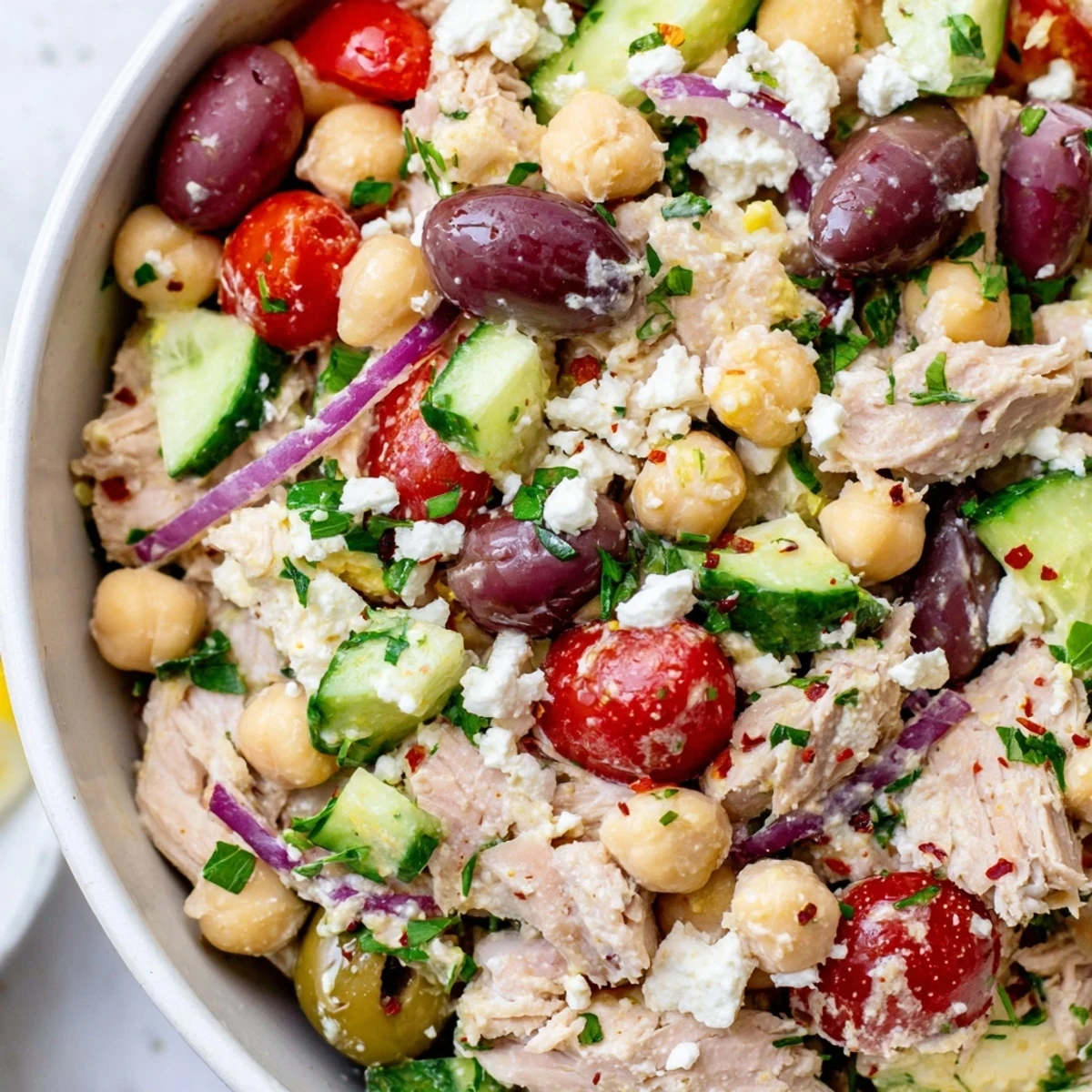 Vibrant Tuna Chickpea Salad, bursting with fresh tomatoes, perfect for a quick lunch.