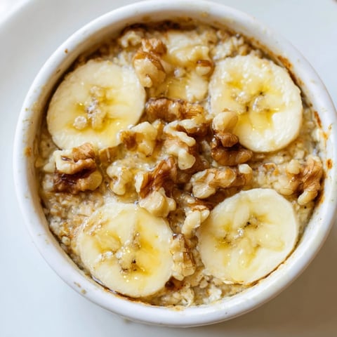 Golden baked oats ramekins with bananas and honey, ready to serve for a delightful breakfast.