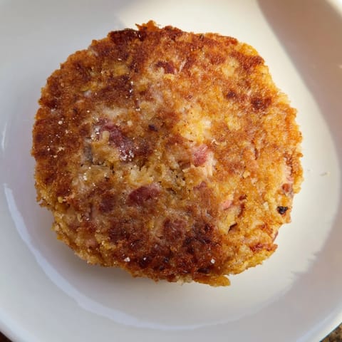 Imagine the savory aroma of these homemade Depression-Era Ham & Potato Patties, perfectly fried, simple comfort food.