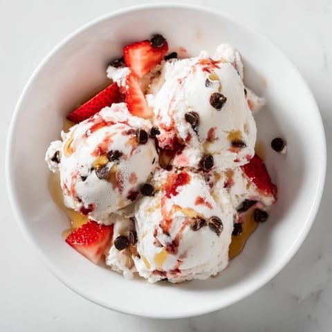 Homemade cottage cheese ice cream, a cool treat, ready to be scooped and enjoyed on a hot day.