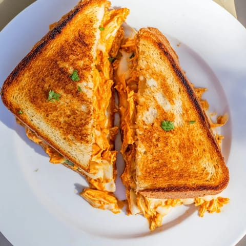 Savory Butter Chicken Grilled Cheese
