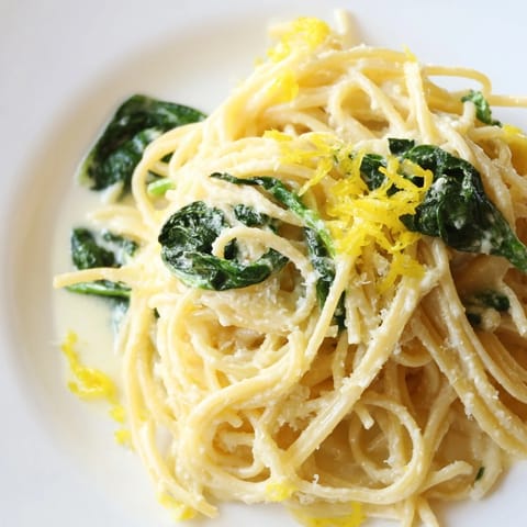 Fresh spinach and lemon zest brighten this easy Creamy Lemon Spinach Spaghetti pasta dish.