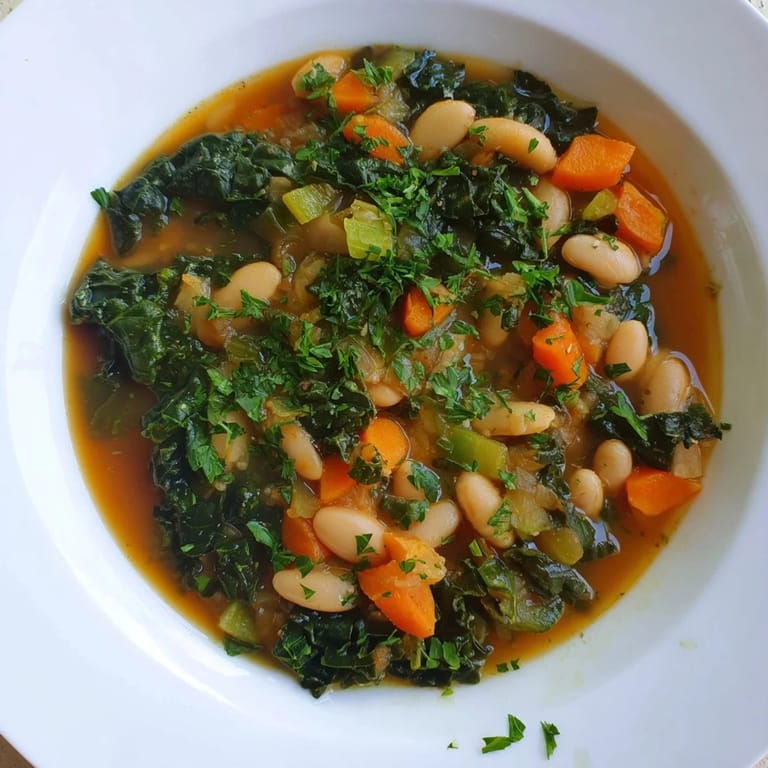 Imagine a vibrant, savory bowl of Italian Bean & Kale Stew, perfect with crusty bread for dipping.