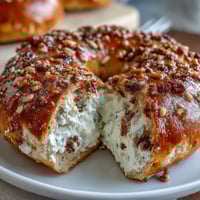 High-Protein Bagels with Greek Yogurt Everything Dip, golden and chewy, topped with savory everything seasoning, served alongside a creamy, tangy Greek yogurt dip.  